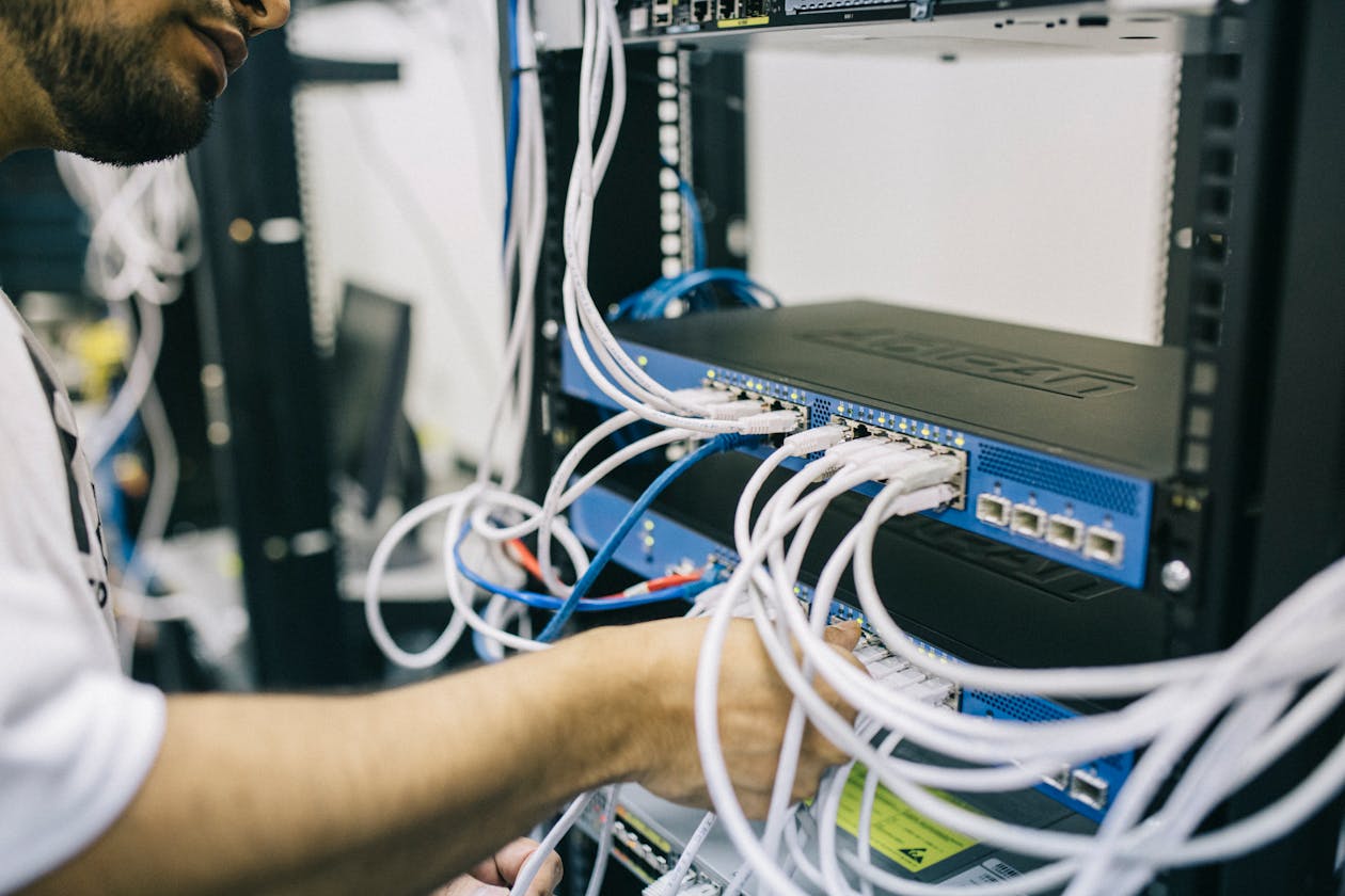Network cables and server infrastructure representing web server vulnerabilities